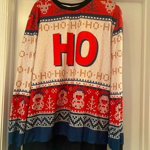 Christmas shirt. Woman’s med but runs very big. Never worn